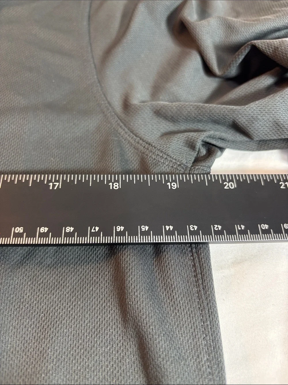 Jordan Black Charlotte Hornets Polo with White Jumpman. 0189